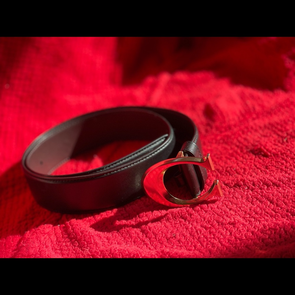 Coach belt , calf leather. Additional hole added for smaller waist women.